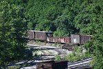 SBD 477384 in the foreground and CSX 918371 right in the center.